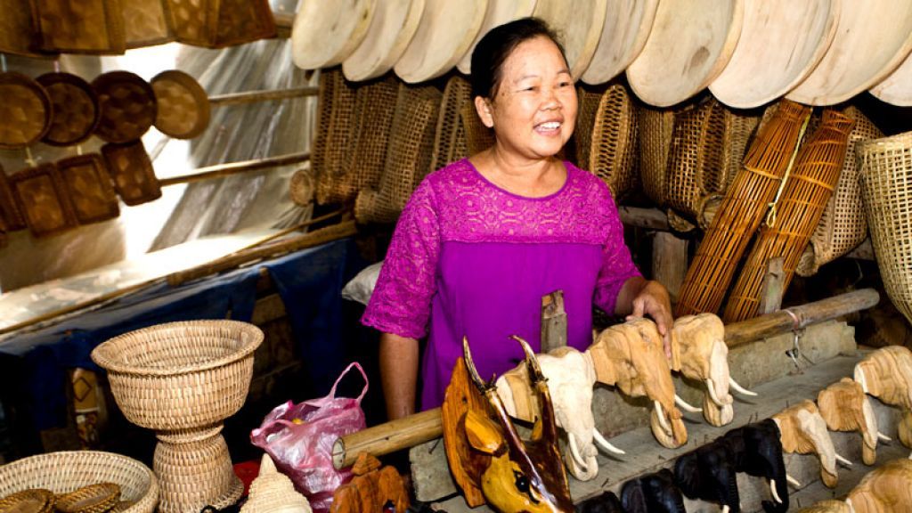 Woman selling ethnic crafts for tourists