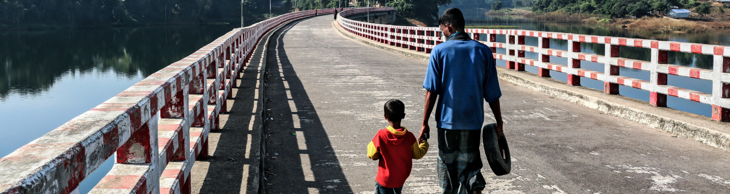 Father and Child on a Bridge